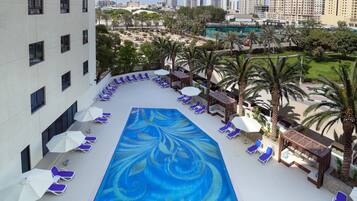 Outdoor pool, open 7:00 AM to 8:00 PM, free pool cabanas, pool umbrellas