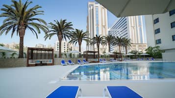 Outdoor pool, open 7:00 AM to 8:00 PM, free pool cabanas, pool umbrellas