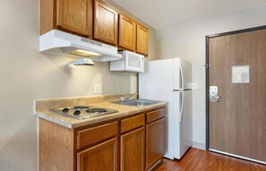 Full-sized fridge, microwave, stovetop, freezer