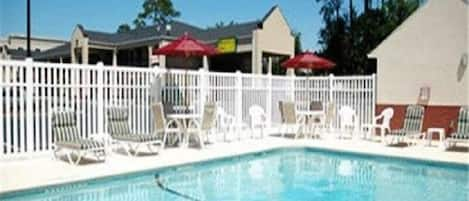 Outdoor pool, open 9:00 AM to 11:00 PM, sun loungers