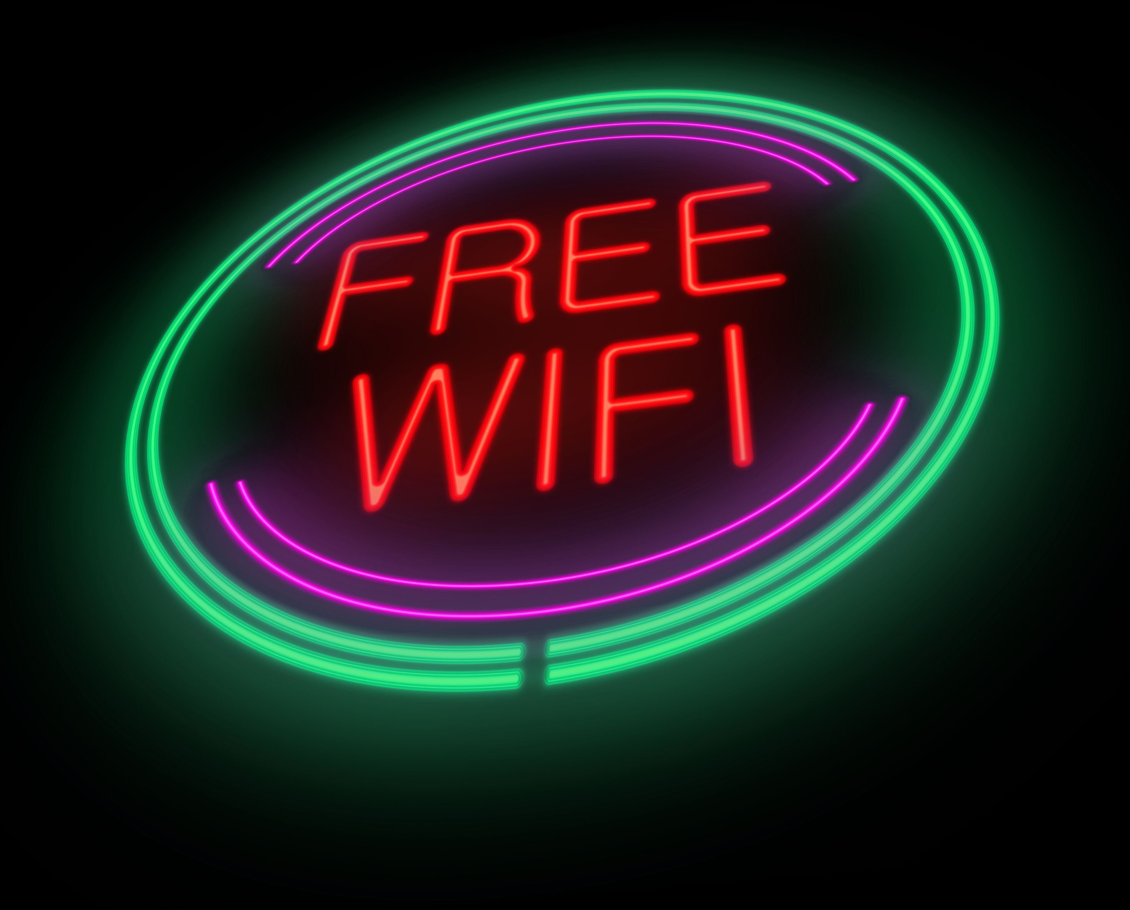 Een neonbord met de tekst 'FREE WIFI'.
