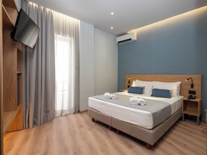 Standaard kamer | Een kluis op de kamer, geluiddichte muren, gratis babybedden