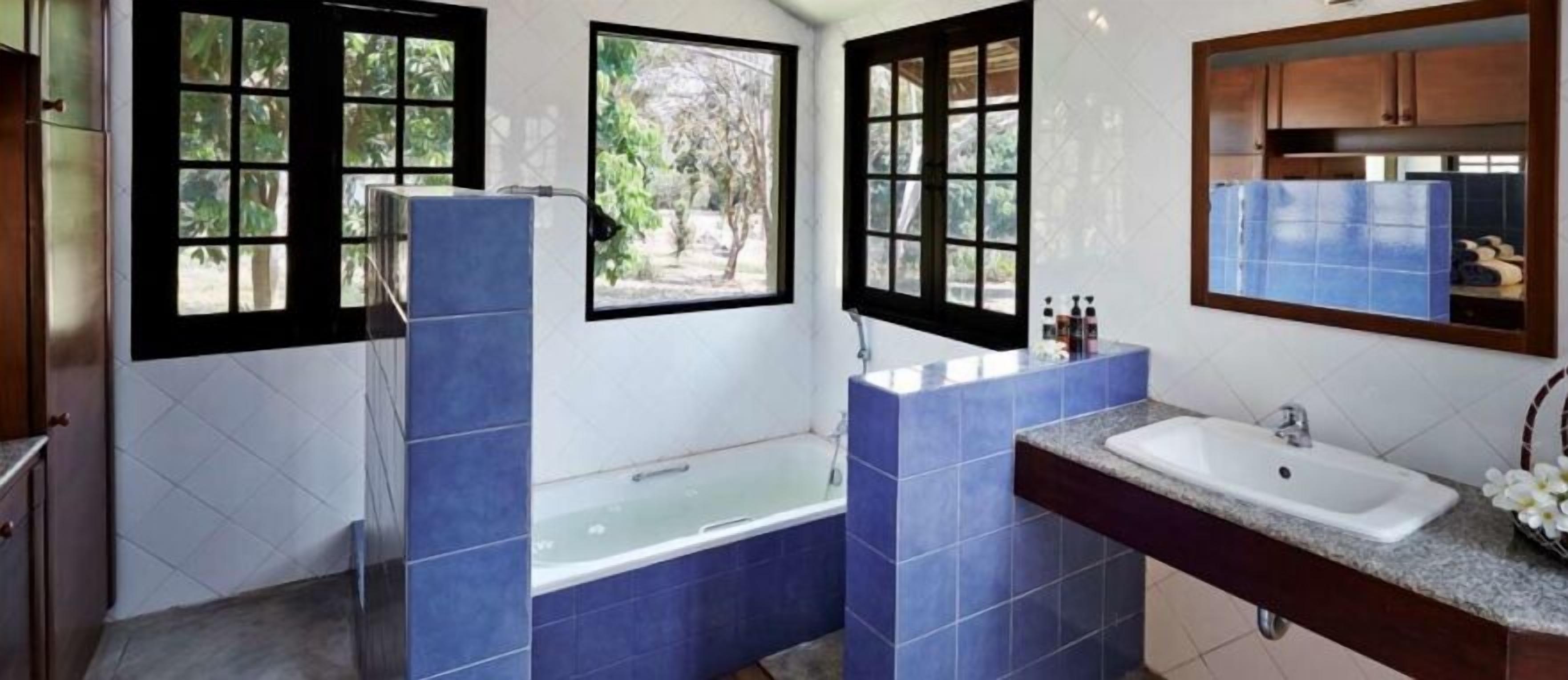 family villa, garden view | bathroom | free toiletries, bathrobes, slippers, towels