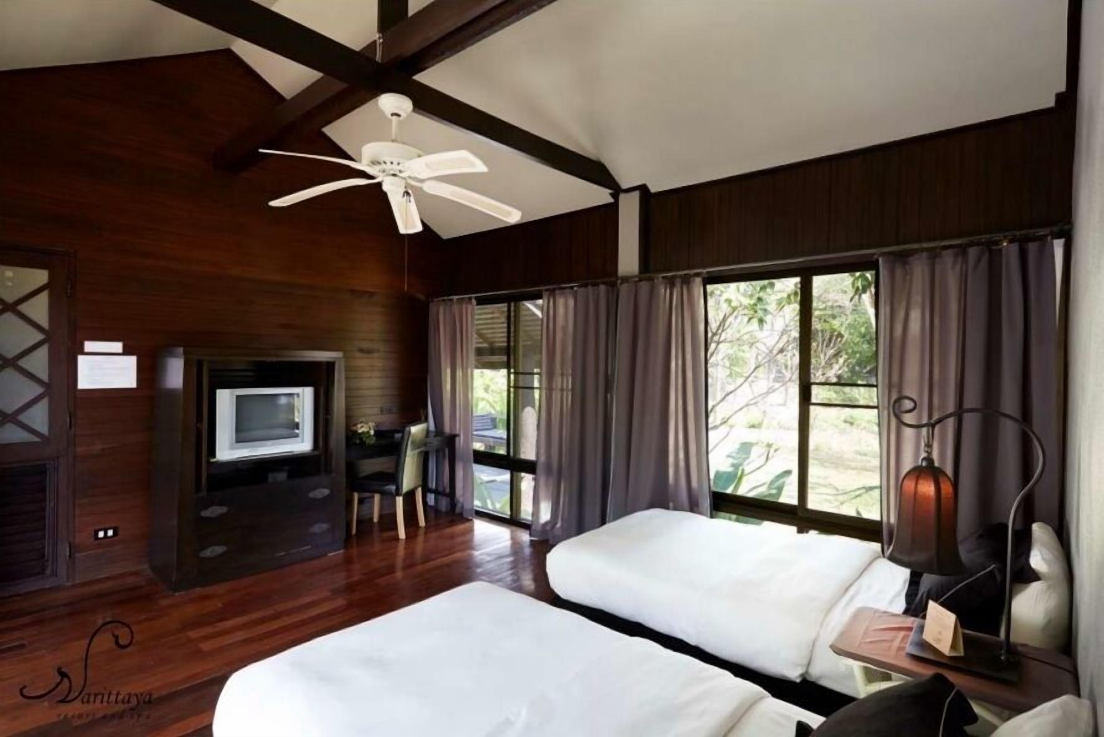 family villa, garden view | premium bedding, minibar, individually furnished, desk