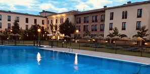 Indoor pool, outdoor pool, pool umbrellas, pool loungers