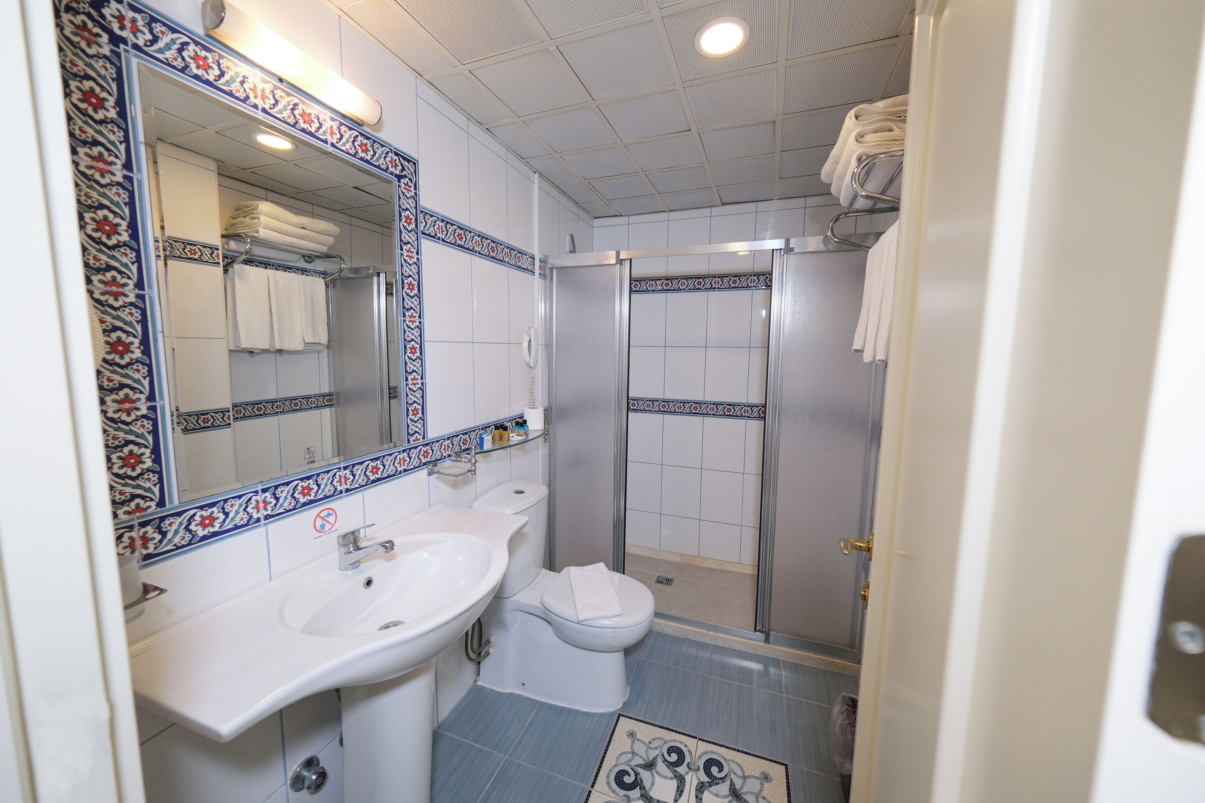 rainfall showerhead, free toiletries, hair dryer, slippers