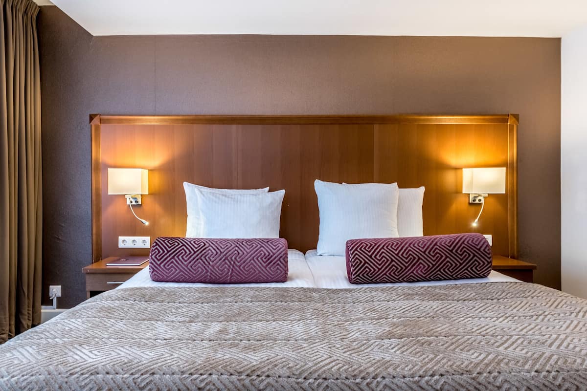Hypo-allergenic bedding available, minibar, in-room safe, desk