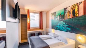 Hypoallergeen beddengoed, een bureau, geluiddichte muren, gratis wifi