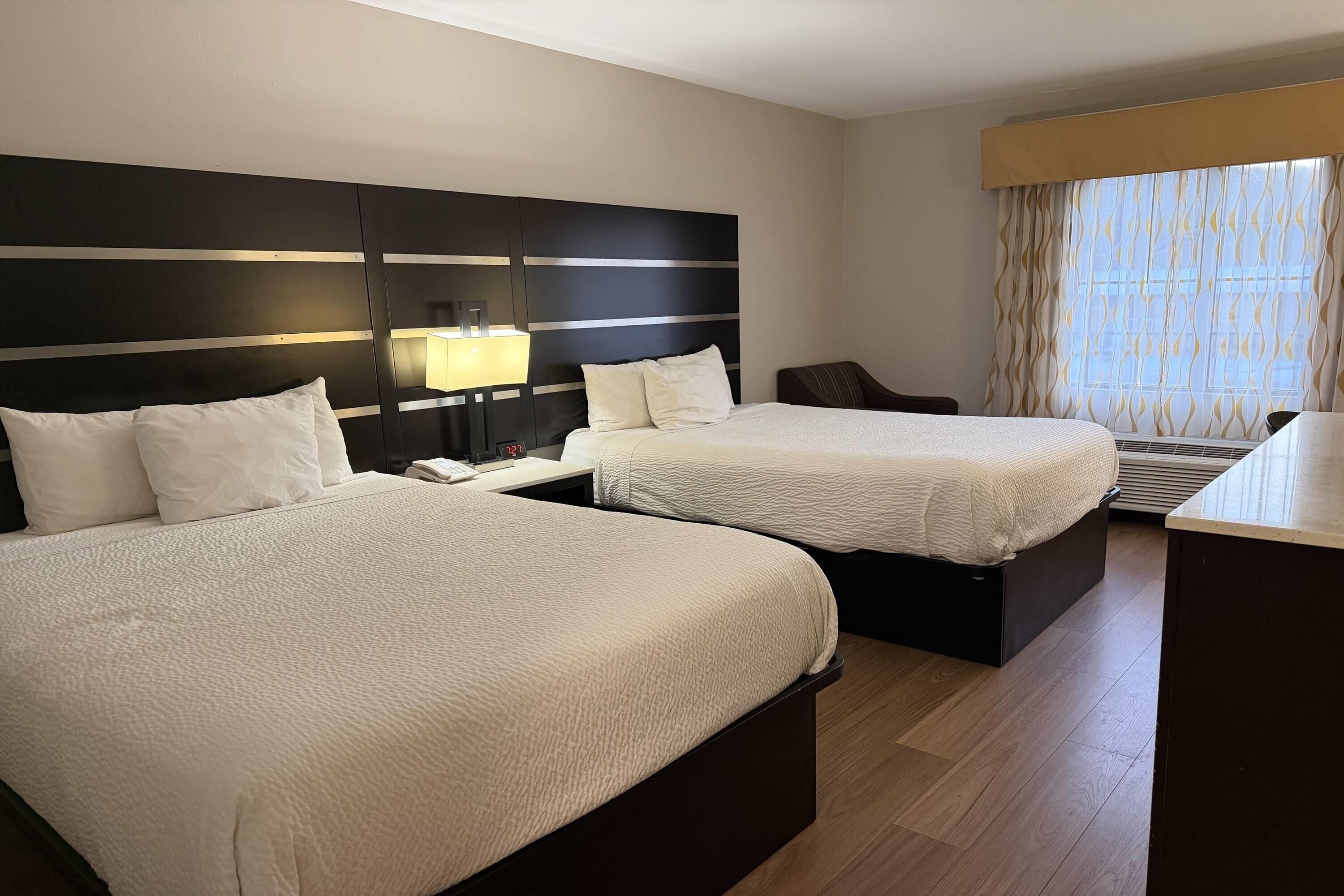 Desk, iron/ironing board, free cribs/infant beds, rollaway beds