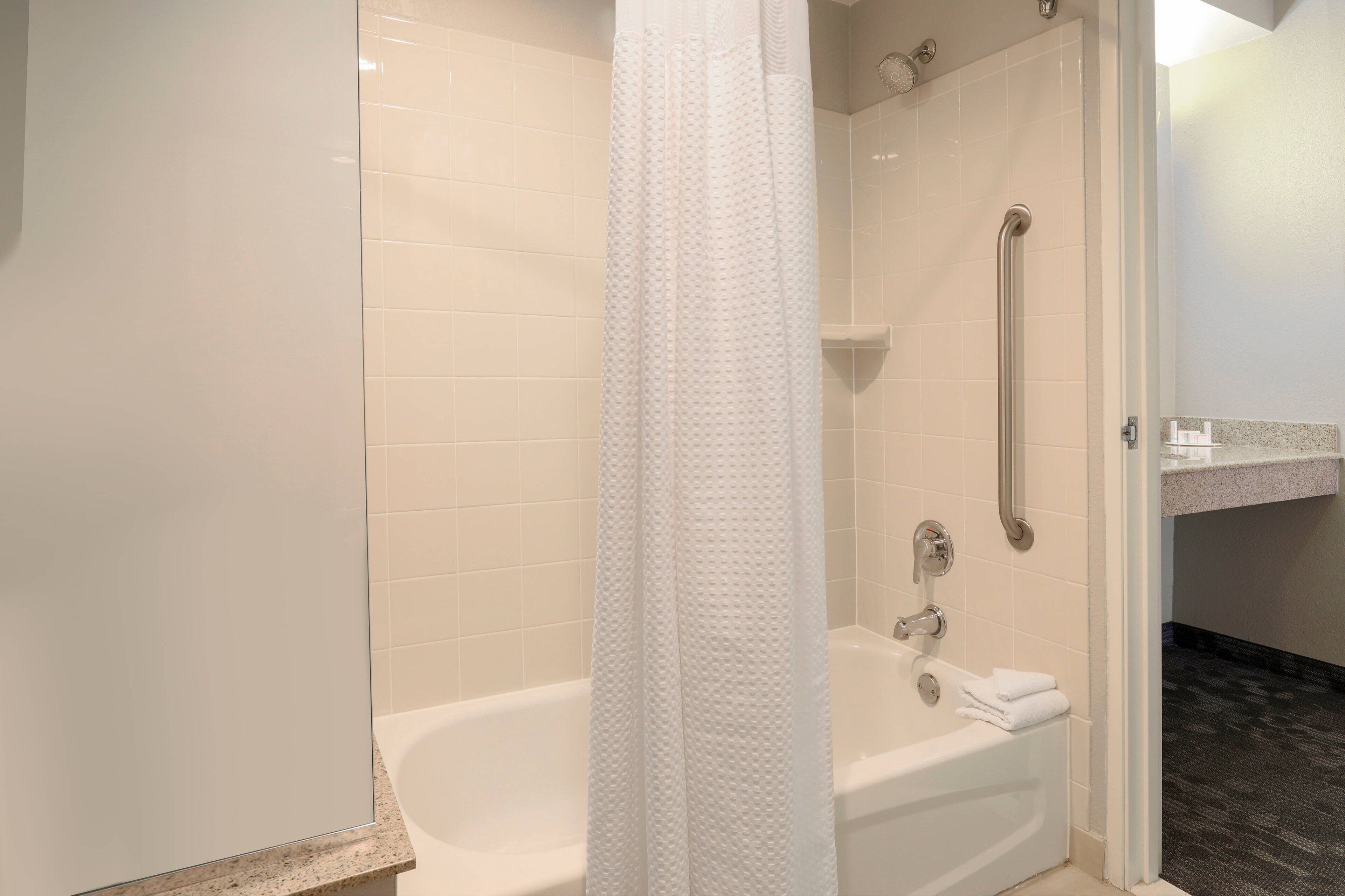 combined shower/bathtub, free toiletries, hair dryer, towels