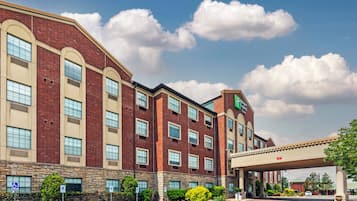 Experience the charm of this Express hotel, featuring a classic brick facade and a spacious entrance.