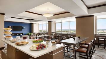 32-inch flat-screen TV with digital channels, TV, iPod dock