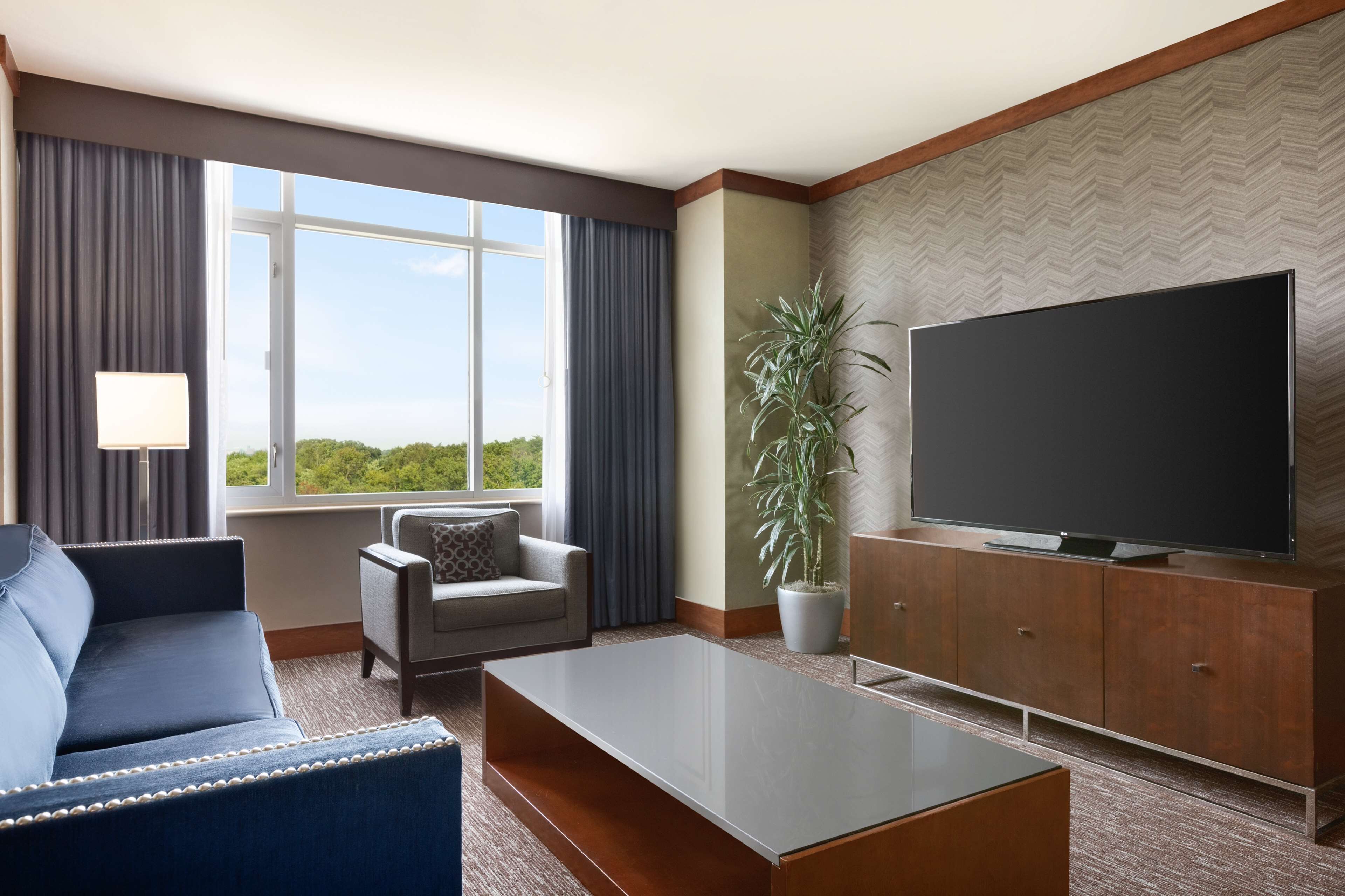 suite | living area | 32-inch flat-screen tv with digital channels, tv, ipod dock