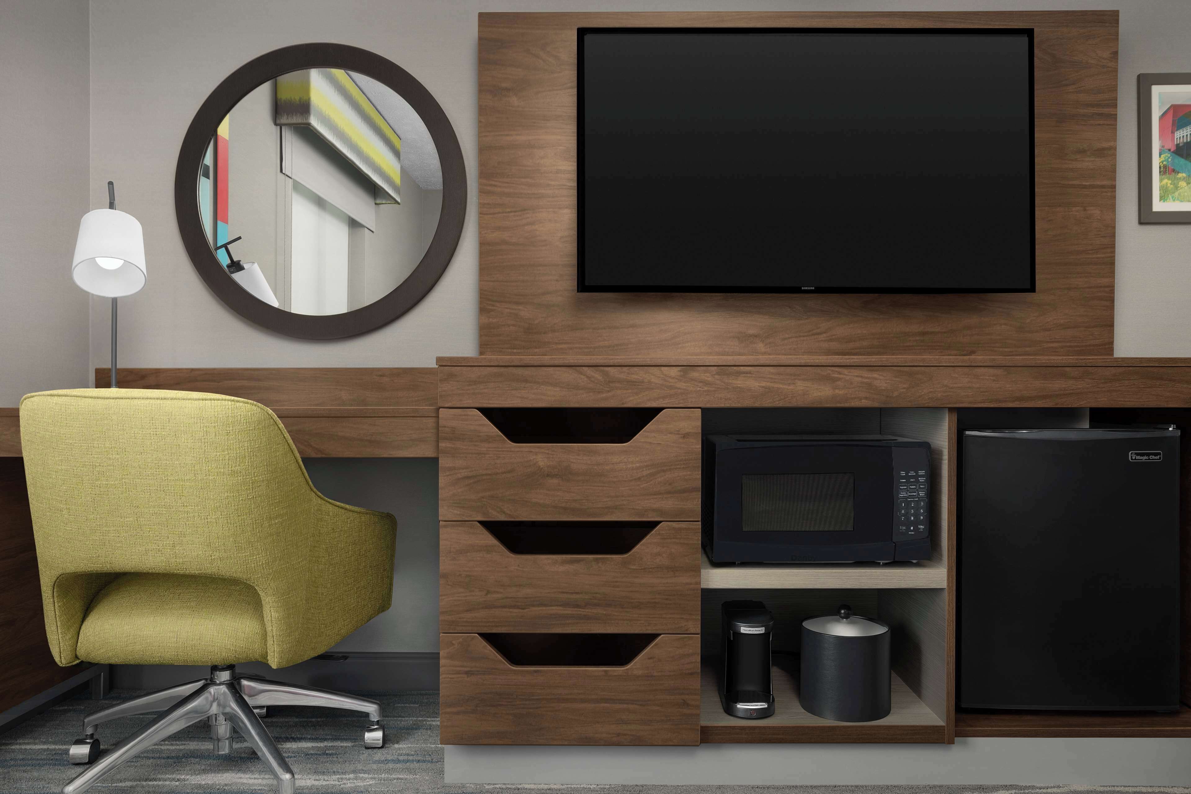 pillow-top beds, desk, laptop workspace, blackout curtains