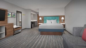 Una habitación de hotel moderna con una cama grande, un escritorio, una silla y un televisor montado en la pared.