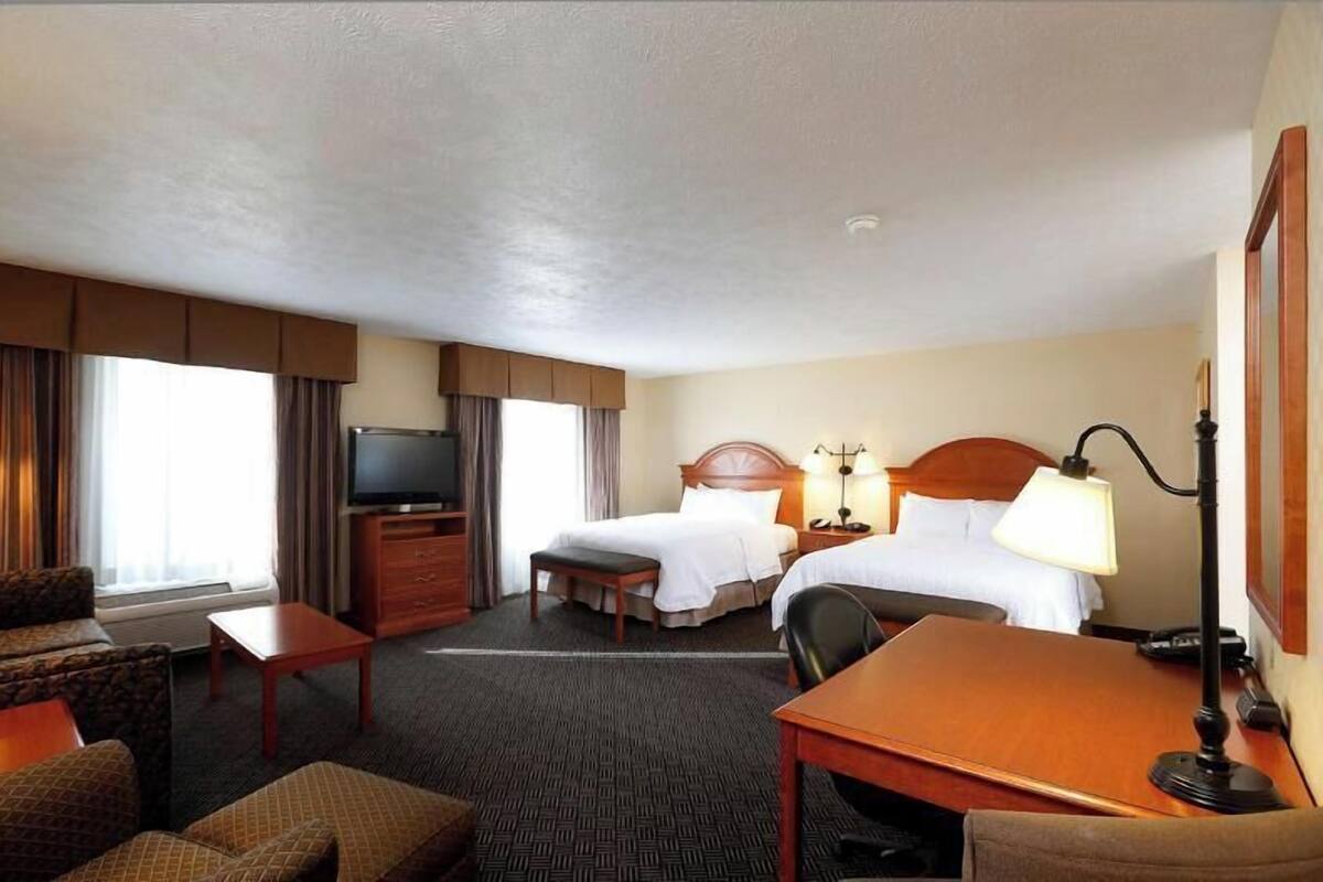 Pillowtop beds, desk, laptop workspace, blackout drapes