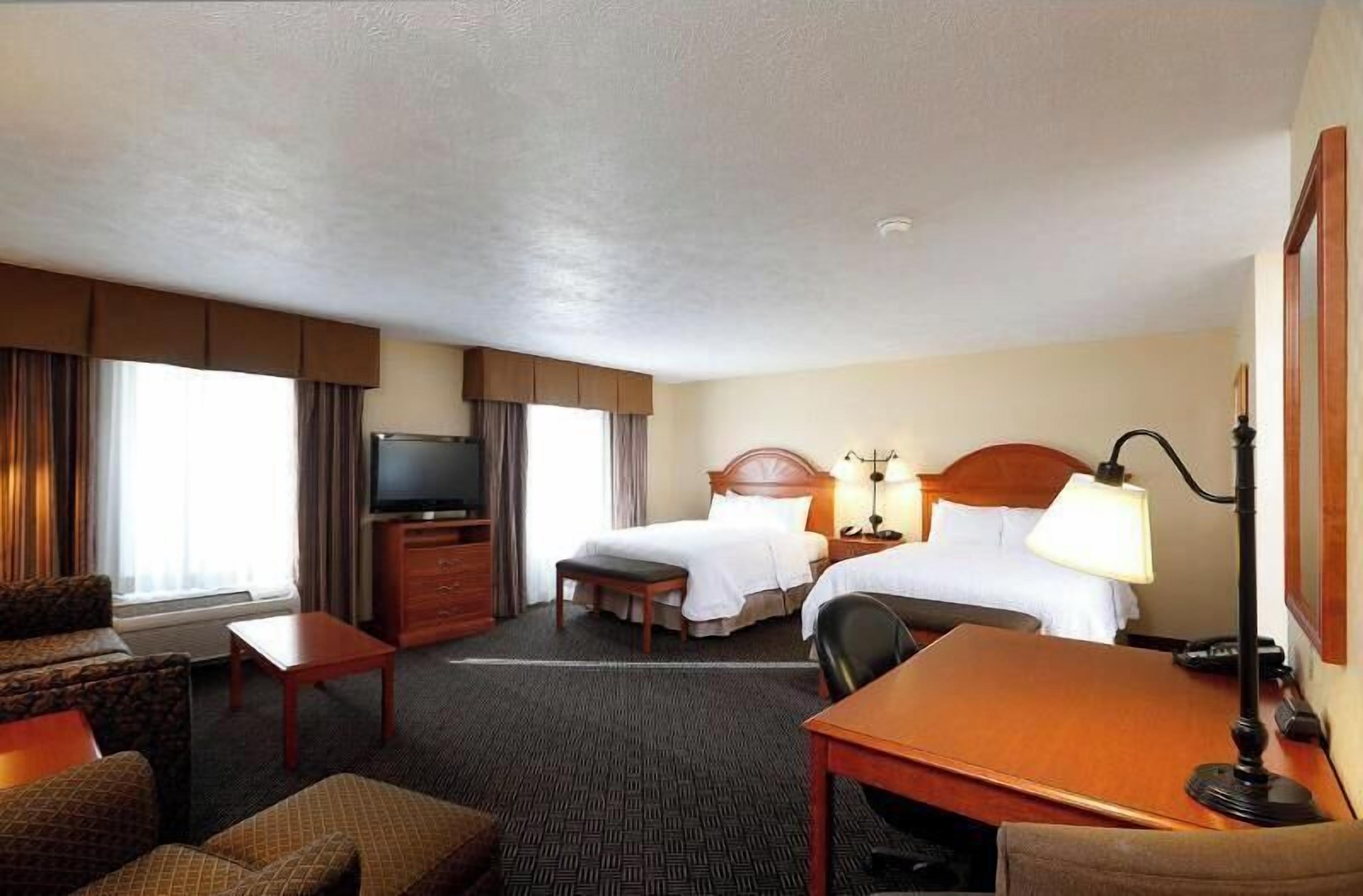 Pillowtop beds, desk, laptop workspace, blackout drapes
