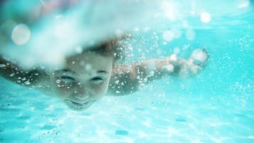 Guests can enjoy a refreshing swim in the pool.