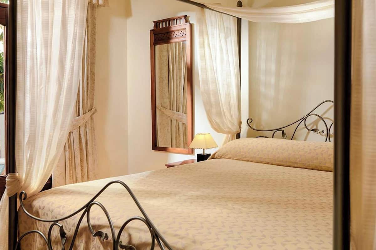 Premium bedding, pillowtop beds, blackout drapes, iron/ironing board