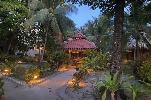 Breakfast, lunch served; local and international cuisine, beach views