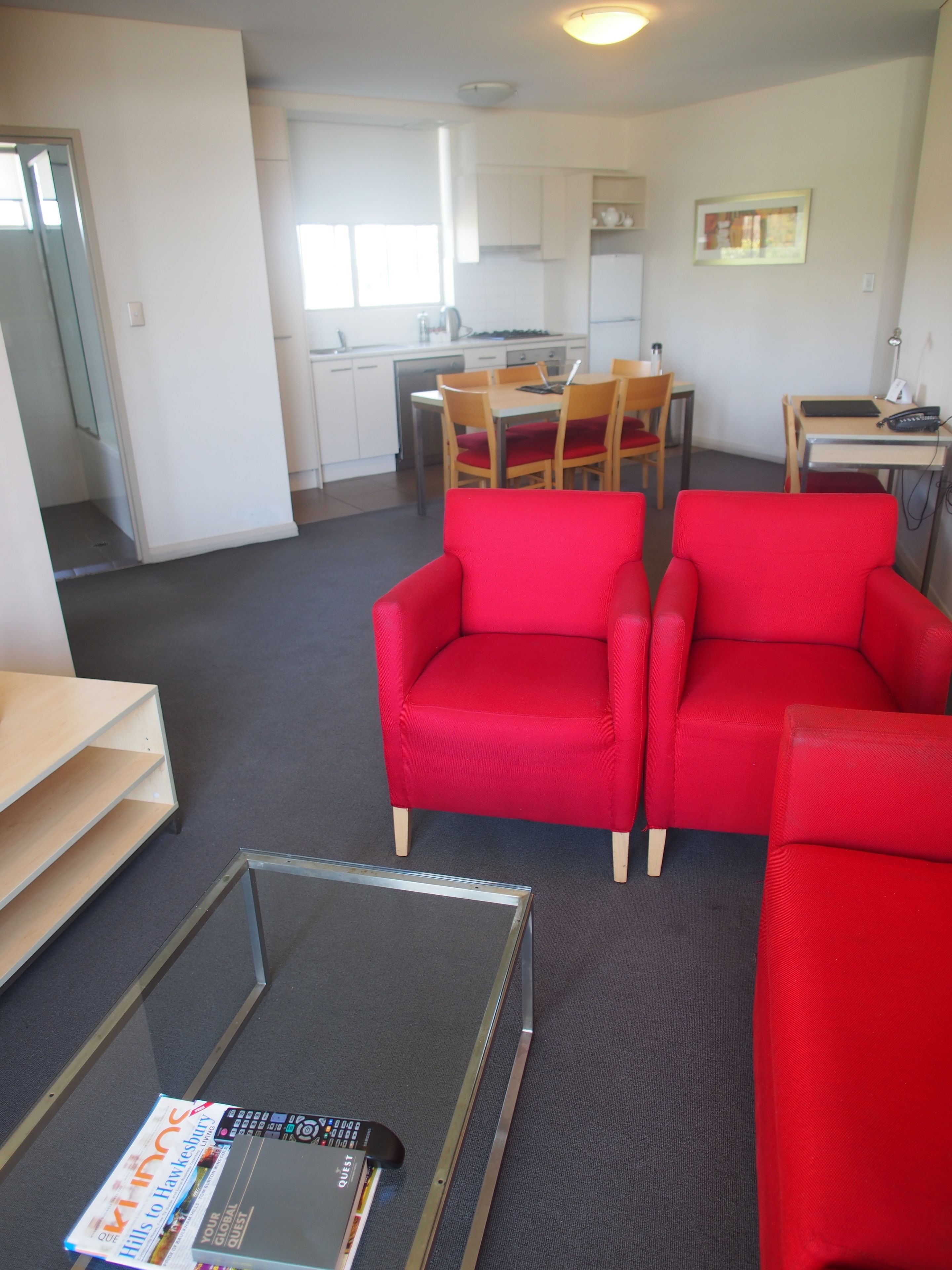 three bedroom apartment | living area | tv, ipod dock