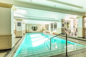 Indoor pool, outdoor pool, open 7 AM to 9:00 PM, pool umbrellas