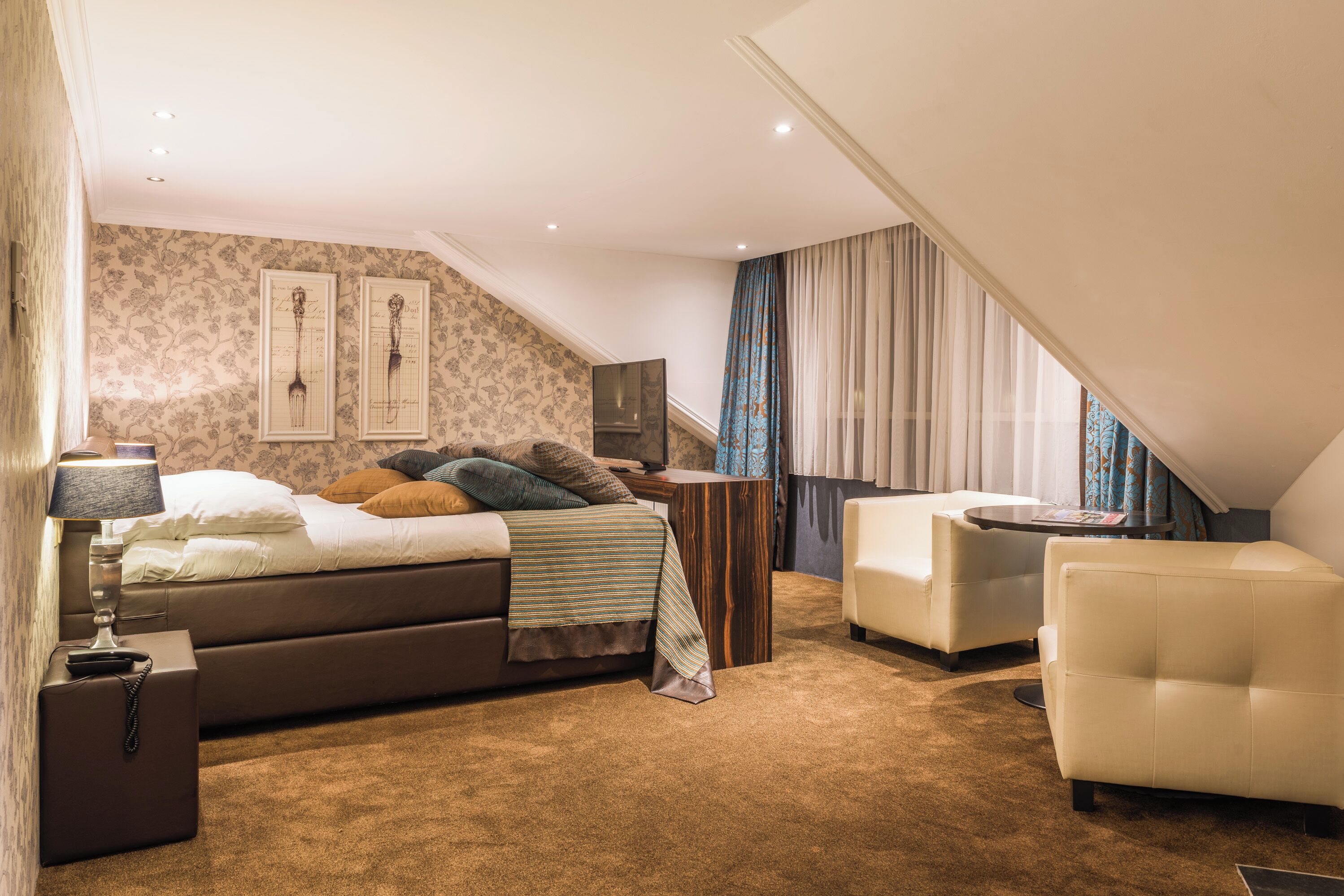 junior suite | 1 bedroom, in-room safe, desk, laptop workspace