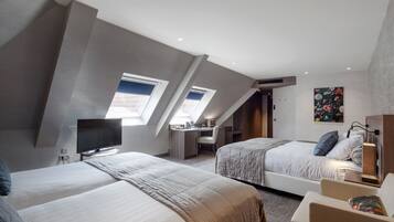 Superior Quadruple Room | Minibar, in-room safe, desk, blackout drapes