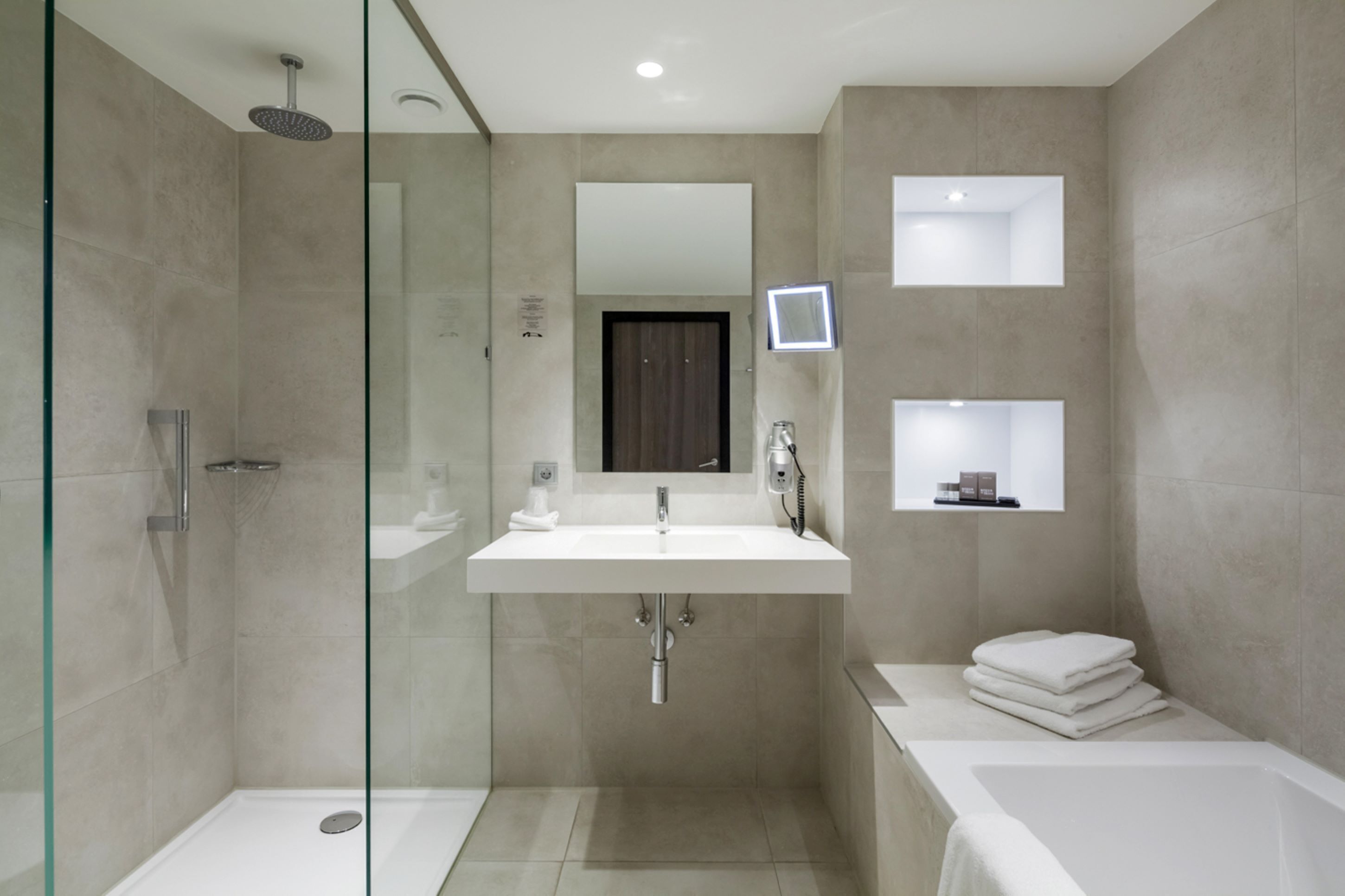 comfort room | bathroom | hair dryer, towels, soap, shampoo