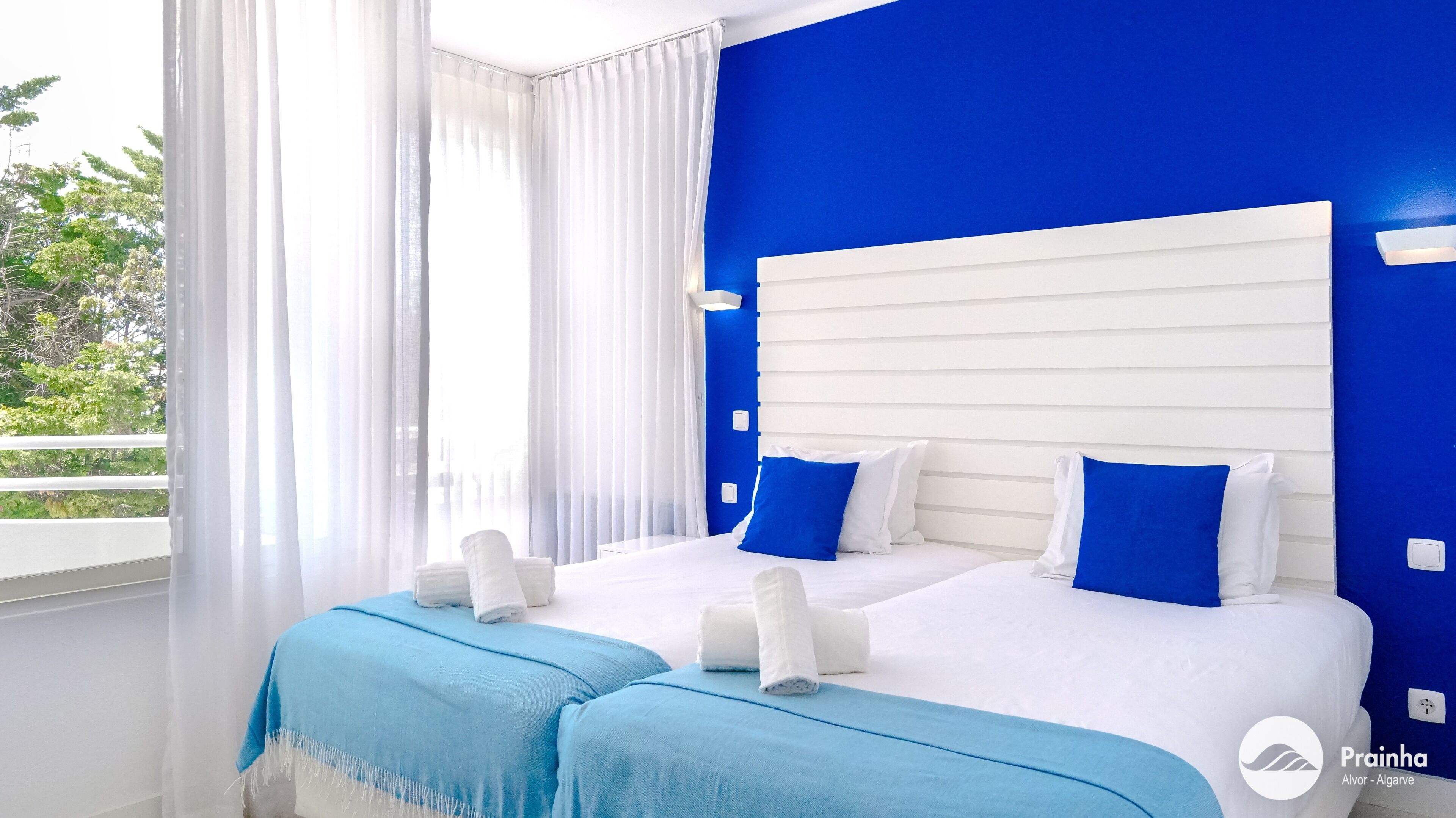 Apartment, 2 Bedrooms | Laptop workspace, blackout curtains, iron/ironing board, free WiFi
