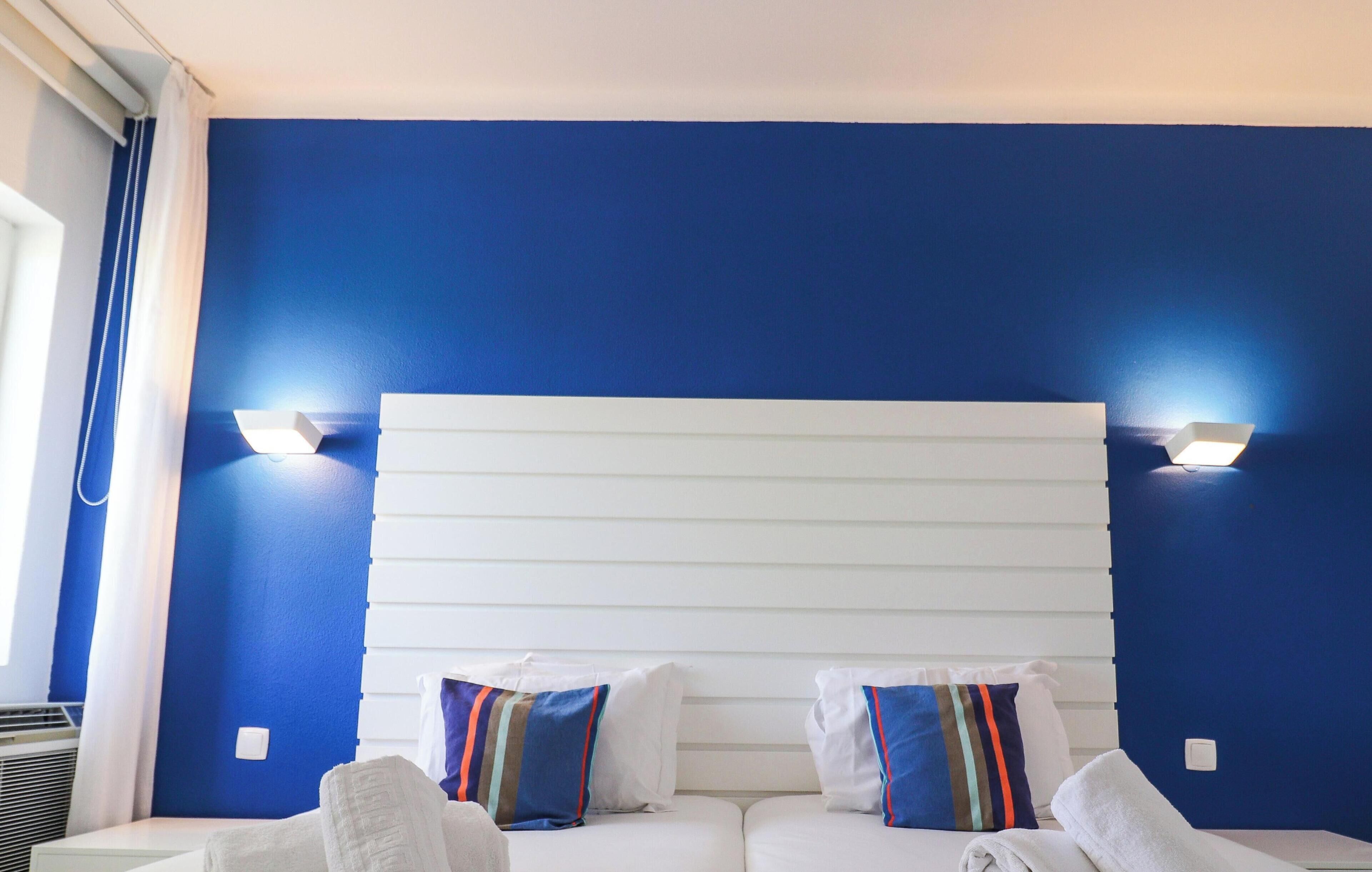 Apartment, 1 Bedroom, Pool View | Laptop workspace, blackout drapes, iron/ironing board, free WiFi