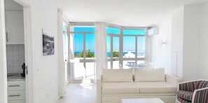 Superior Apartment, 2 Bedrooms | Living area | TV