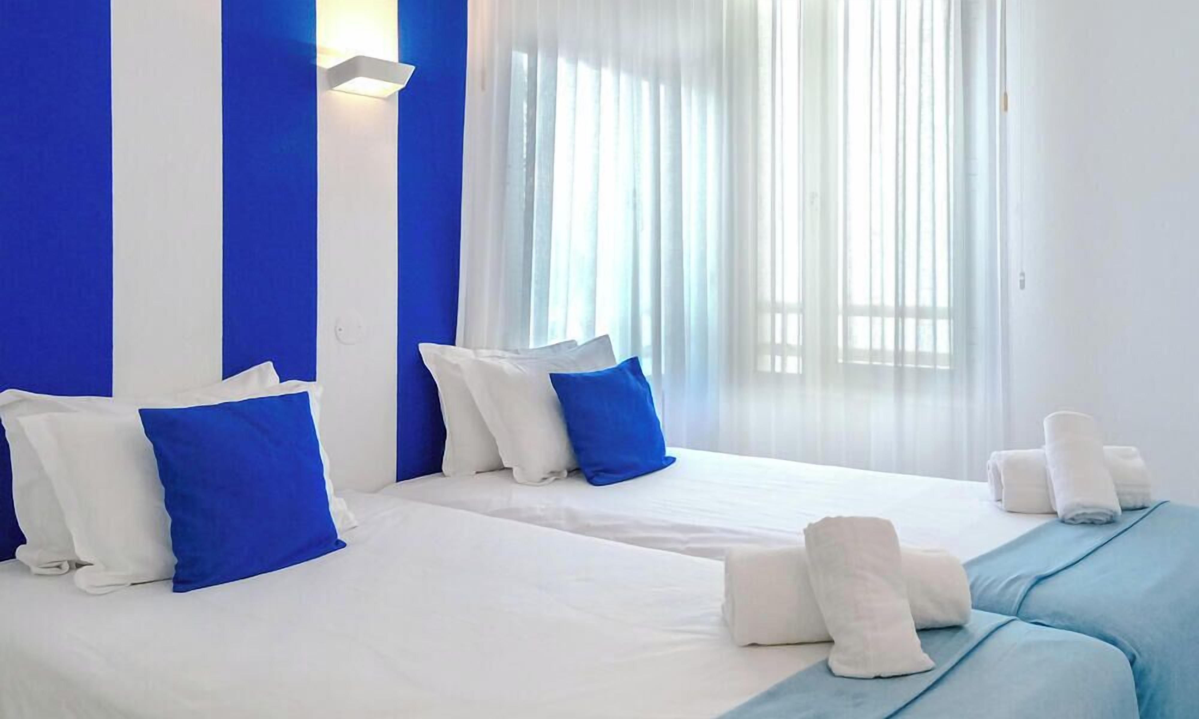 Apartment, 1 Bedroom, Sea View | Laptop workspace, blackout drapes, iron/ironing board, free WiFi