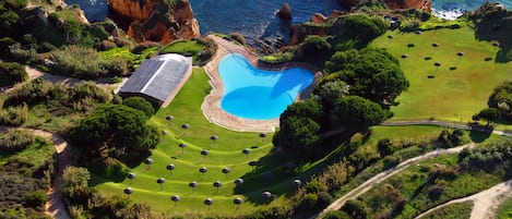 Seasonal outdoor pool, pool umbrellas, sun loungers