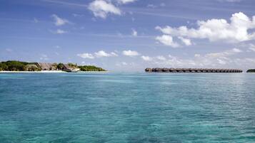 White sand, beach towels, beach massages, water skiing