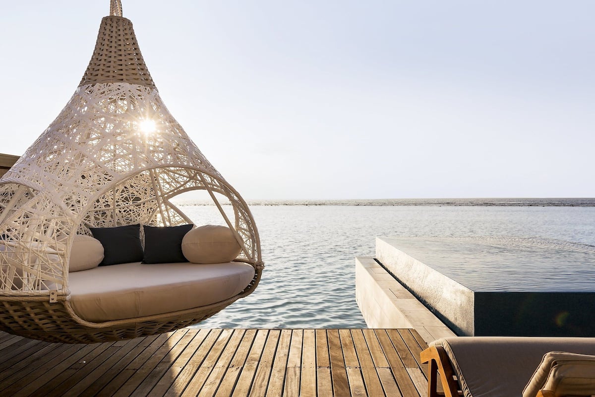 romantic pool water villa | premium bedding, minibar, in-room safe, blackout curtains