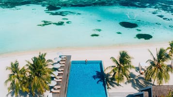 White sand, beach towels, beach massages, water skiing