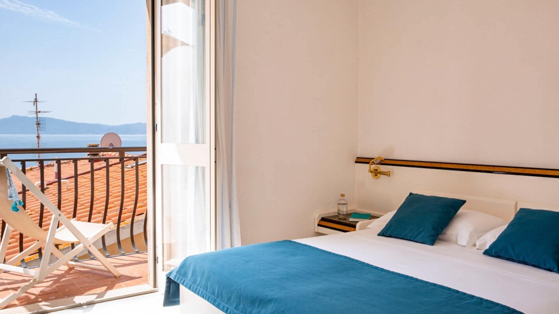 Comfort Double or Twin Room | Minibar, desk, blackout curtains, bed sheets