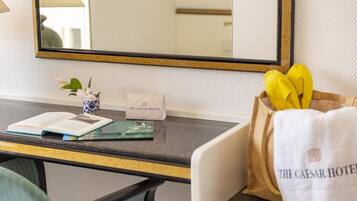 Minibar, desk, blackout curtains, bed sheets