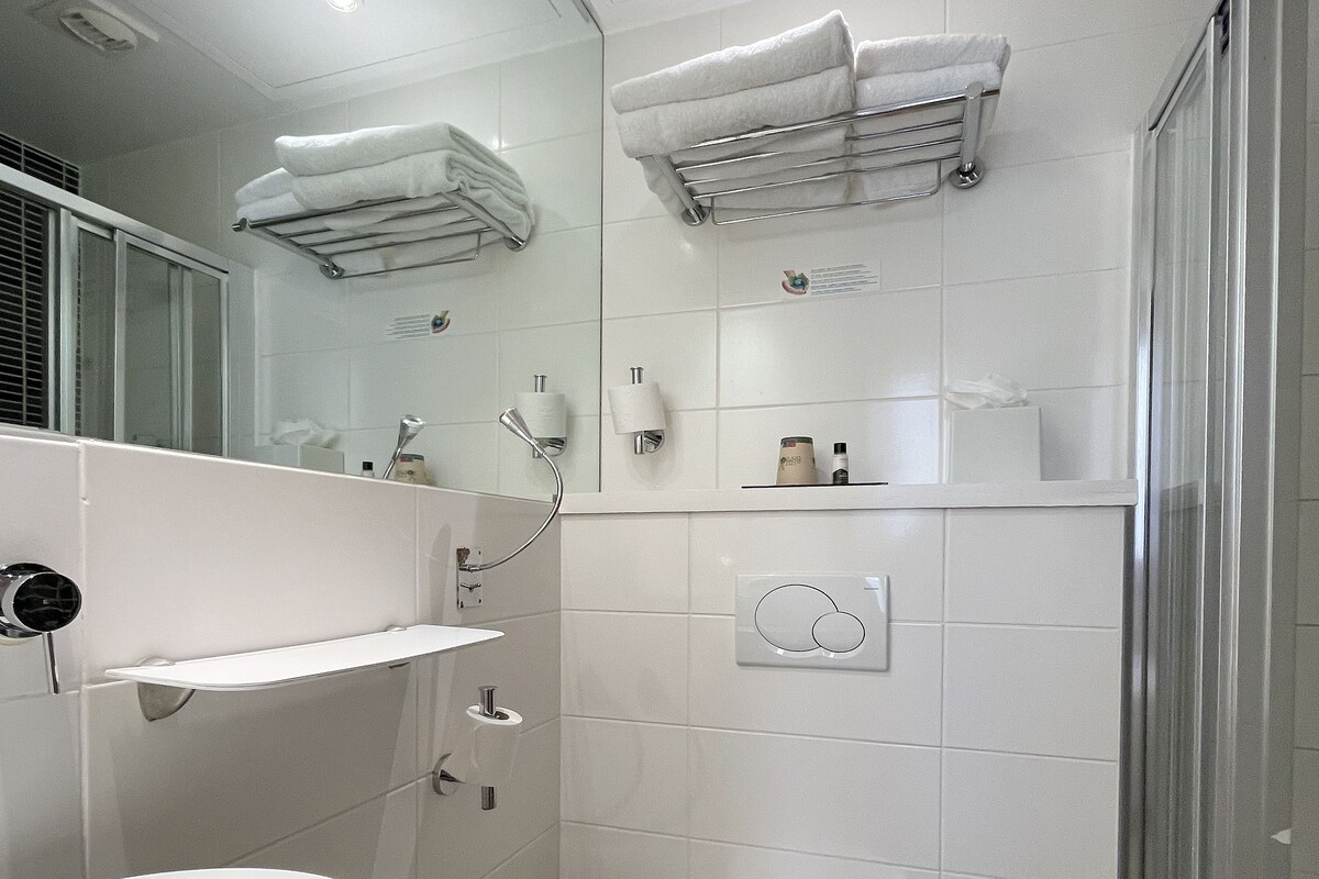 Bathroom | Shower, rainfall showerhead, designer toiletries, hair dryer