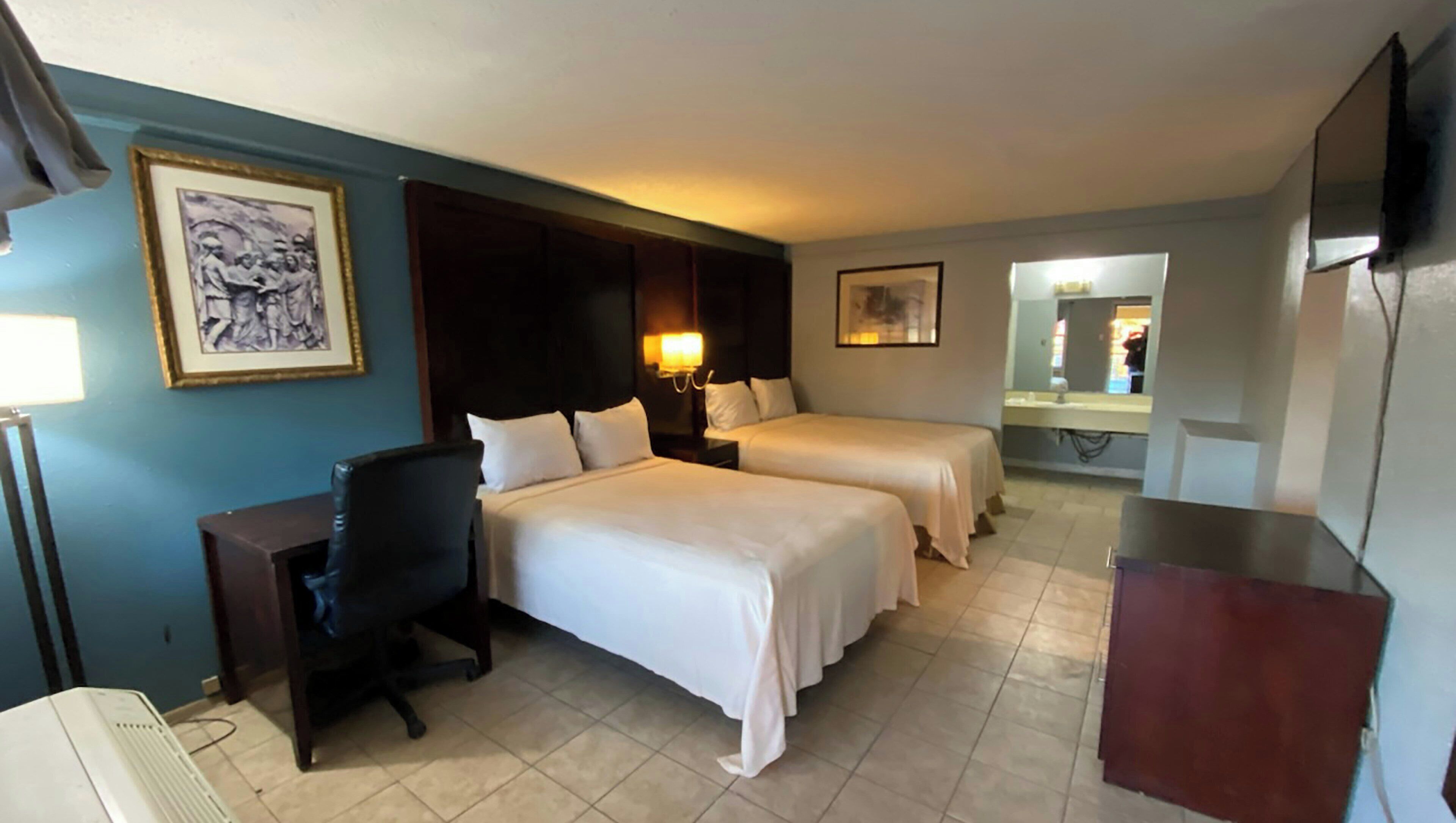 Suite, 2 Tempat Tidur Double, Bebas Asap Rokok, dapur kecil | Meja kerja, ruang kerja ramah laptop, dan setrika/meja setrika