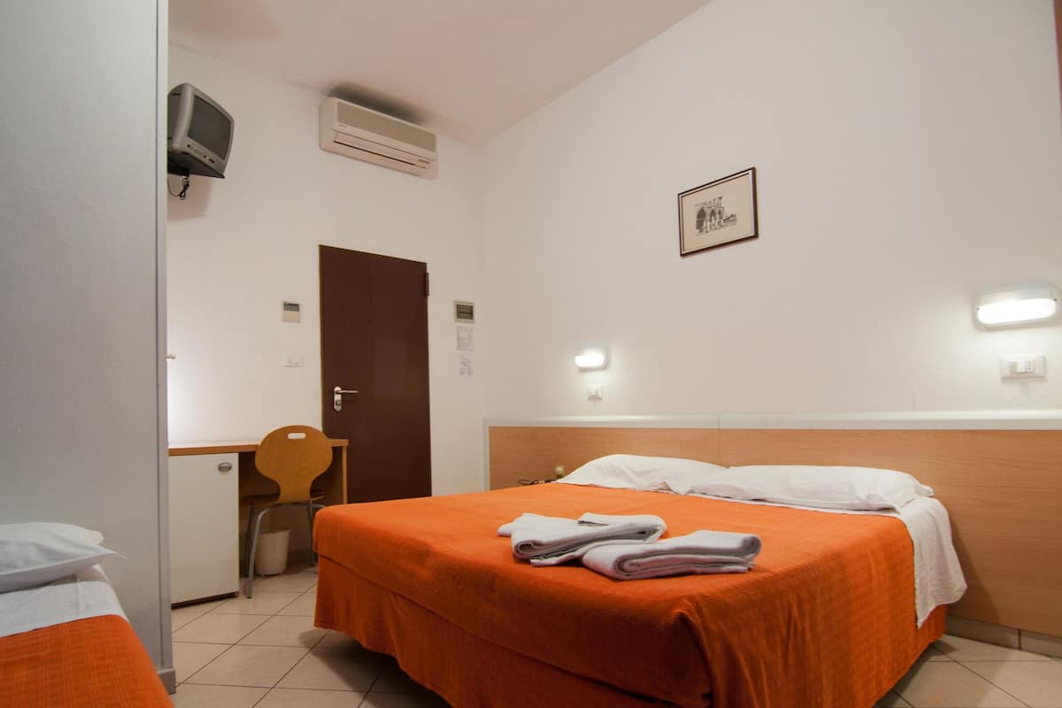 Desk, WiFi (free), bed sheets
