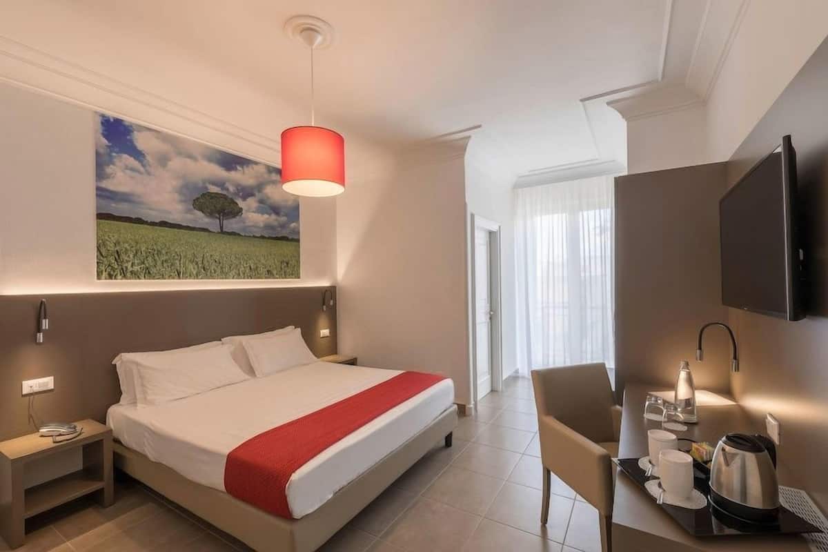 Premium bedding, down comforters, minibar, in-room safe