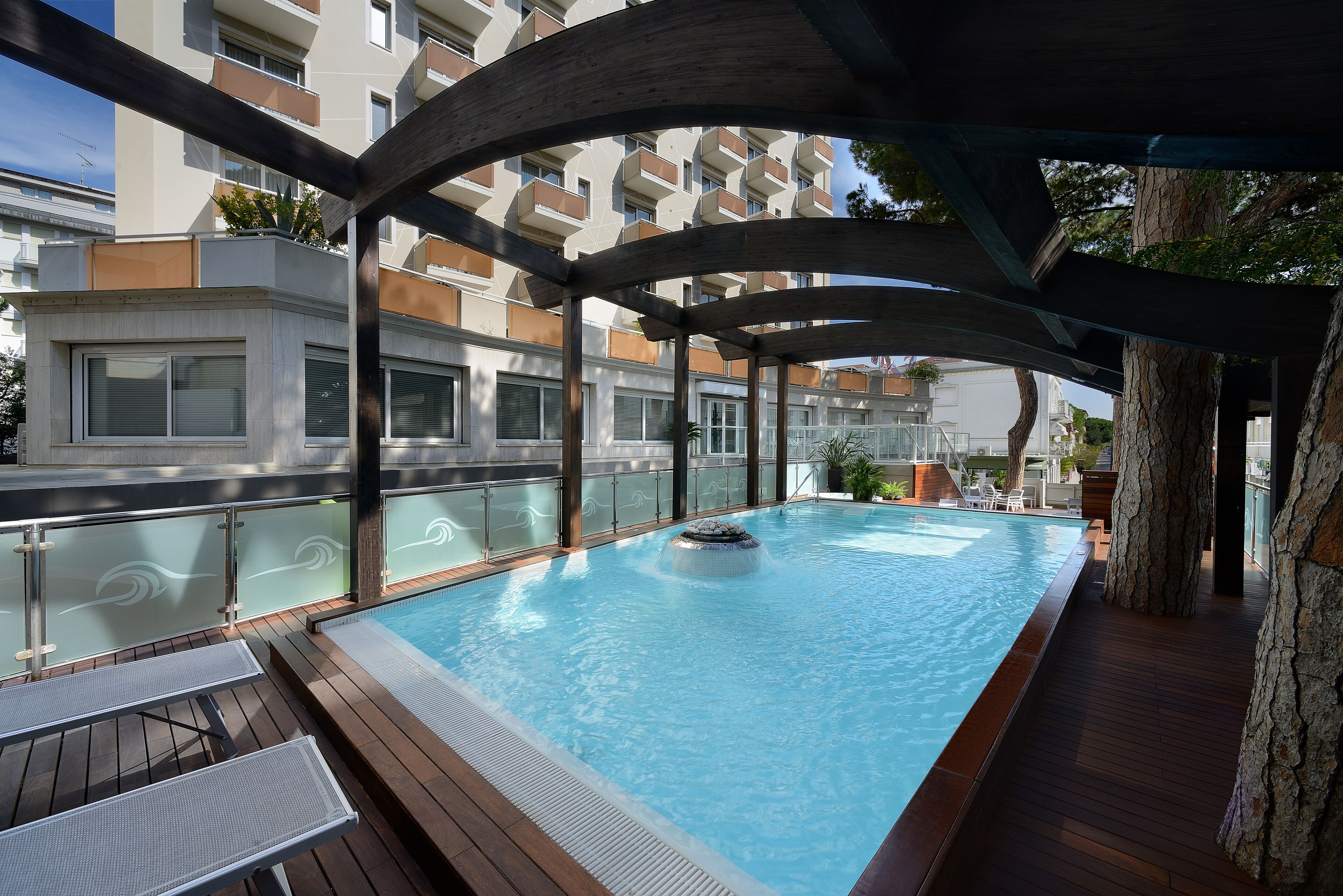 seasonal outdoor pool, open 9:30 am to 9:30 pm, pool loungers