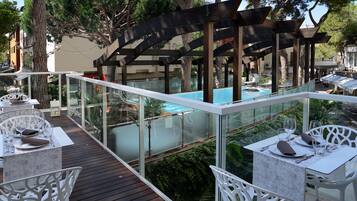 Dinner served, Italian cuisine, pool views