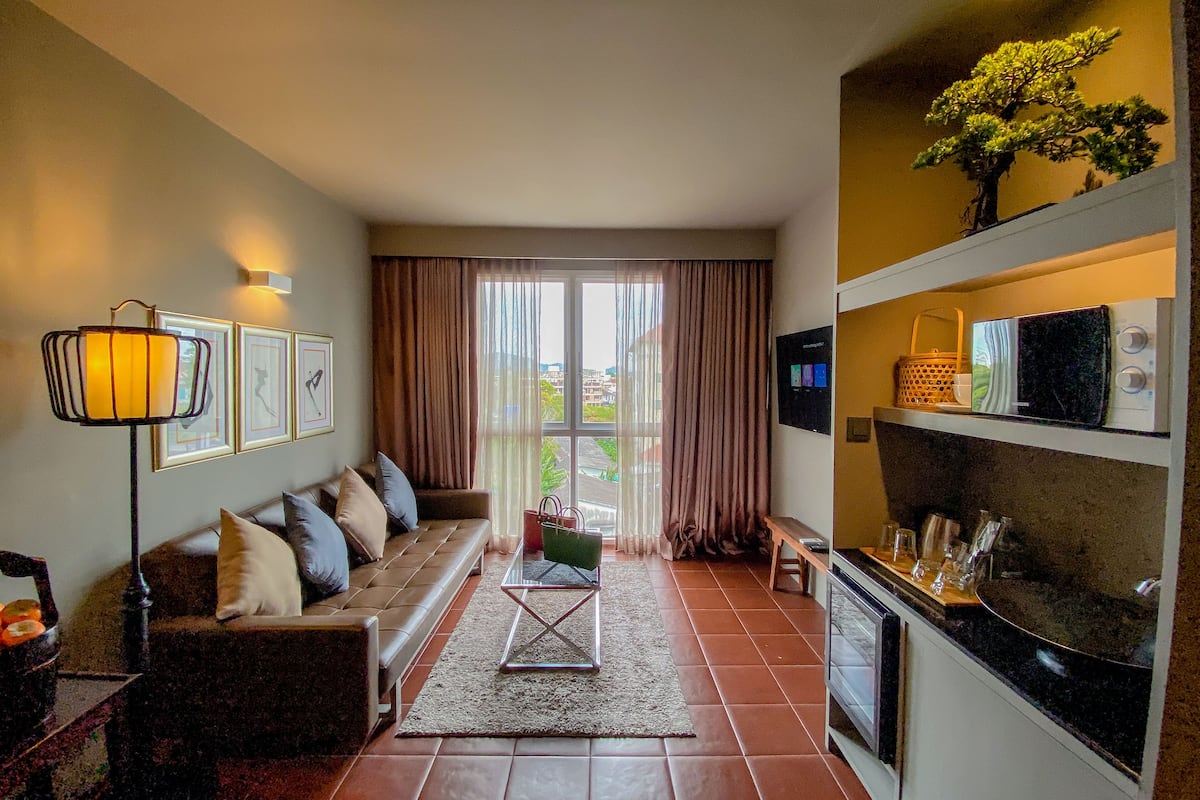 Free minibar, in-room safe, desk, iron/ironing board