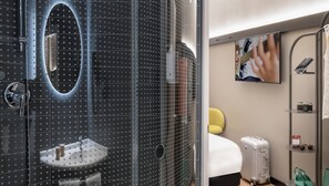 Shower, eco-friendly toiletries, hair dryer, towels