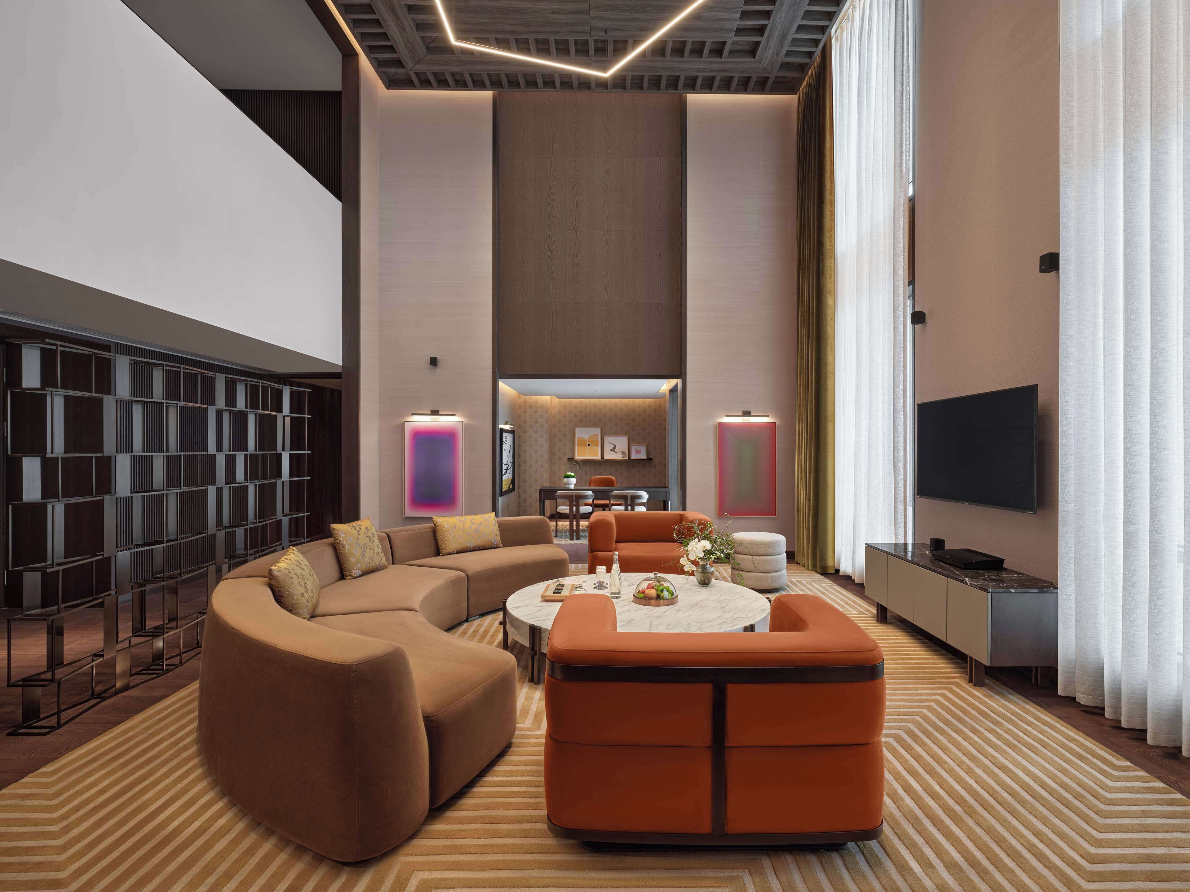 presidential suite | living area | 60-inch lcd tv with satellite channels, tv