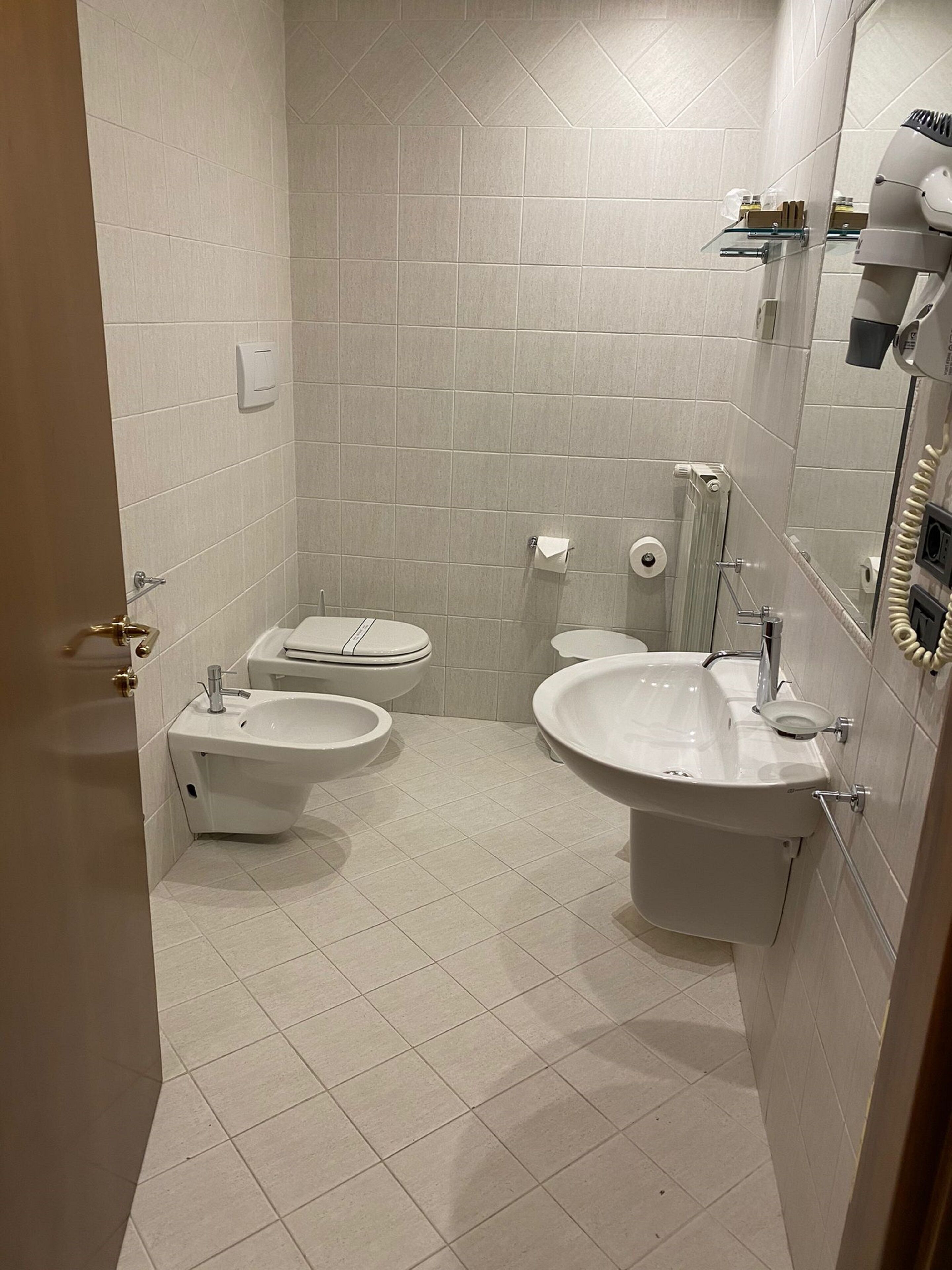 double room single use | bathroom | shower, hair dryer, slippers, bidet