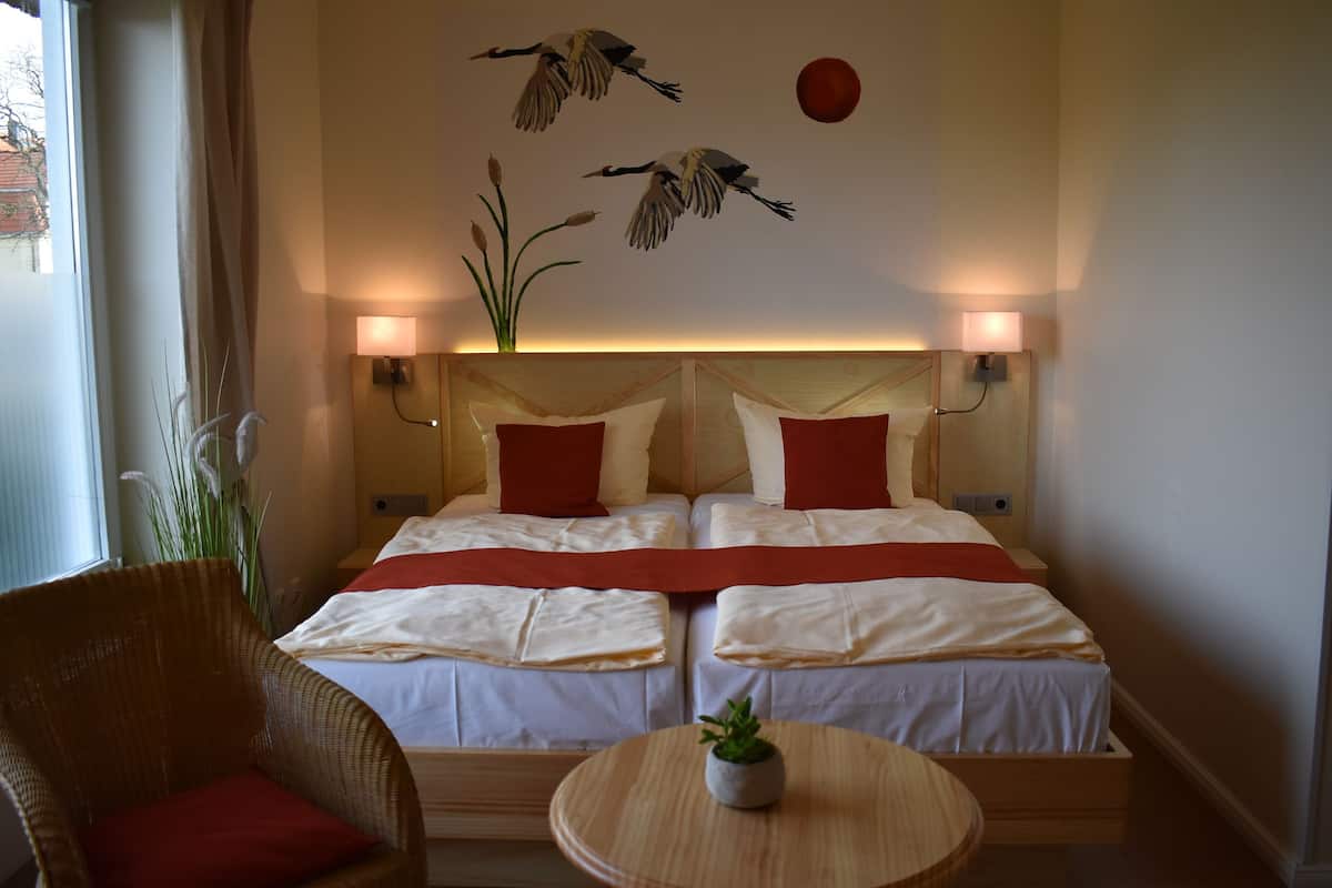 Comfort Double Room, Garden View | Minibar, in-room safe, desk, free cribs/infant beds